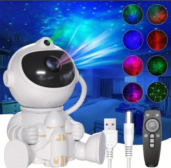 Astronaut-shaped galaxy projector with remote and USB cable projecting colorful starry skies
