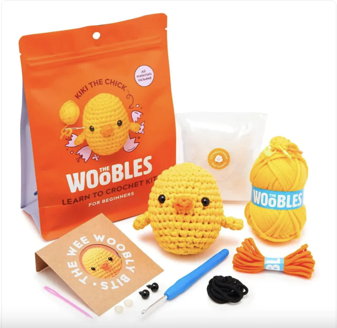Beginner crochet kit with yarn, tools, and chick design