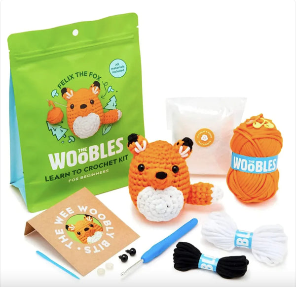 Beginner crochet kit with yarn, tools, and fox design