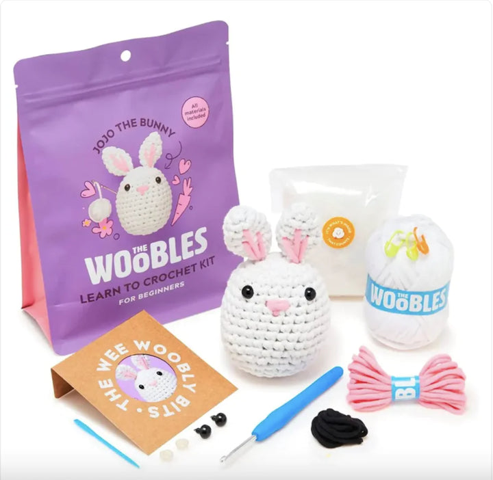 Beginner crochet kit with yarn, tools, and rabbit design