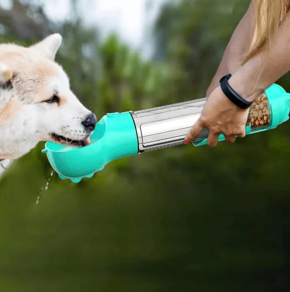 3-in-1 portable dog water bottle and food dispenser in use outdoors