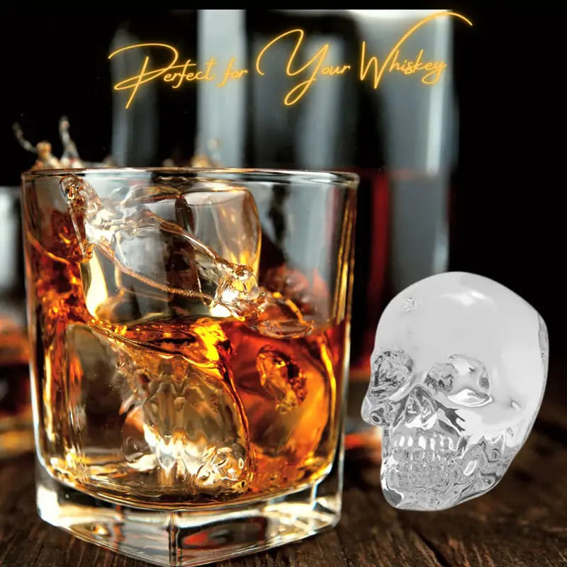 Whiskey glass filled with skull-shaped ice cube